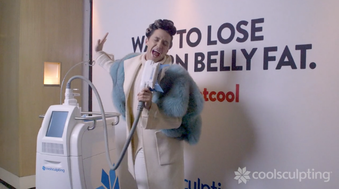 Johnny Weir Singing into a CoolSculpting Applicator