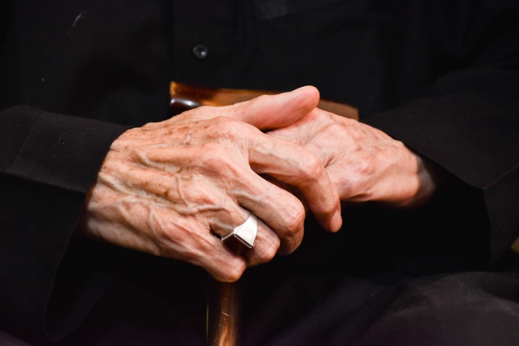 Wrinkled, elderly hands