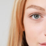 Beautiful young woman with bright eyes.